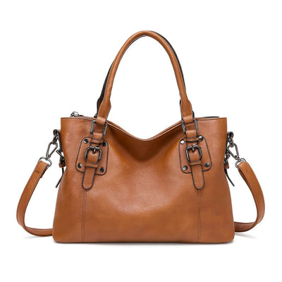 Cassie | Kožna torba s detaljem kopče